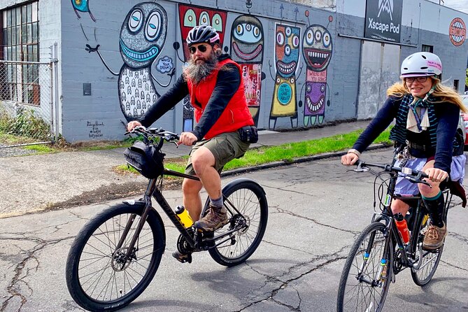 Bike Around Portland Oregon: Art, Culture, Bridges, Poetry - Solterra Building and MAX Orange Line Art: Concrete Wordplay to Fin DAC